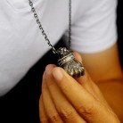 A Fist Necklace With Brave Personality